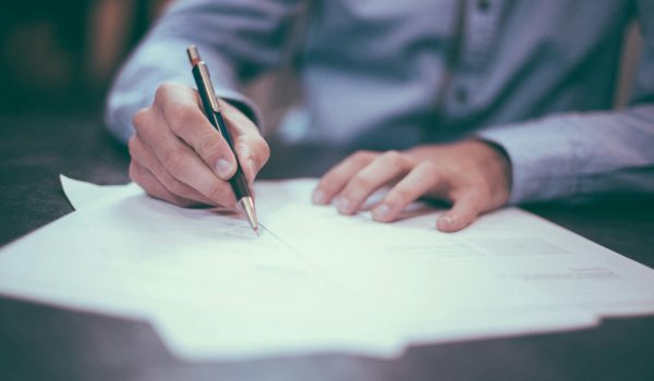 A compliance officer reviewing legal documents